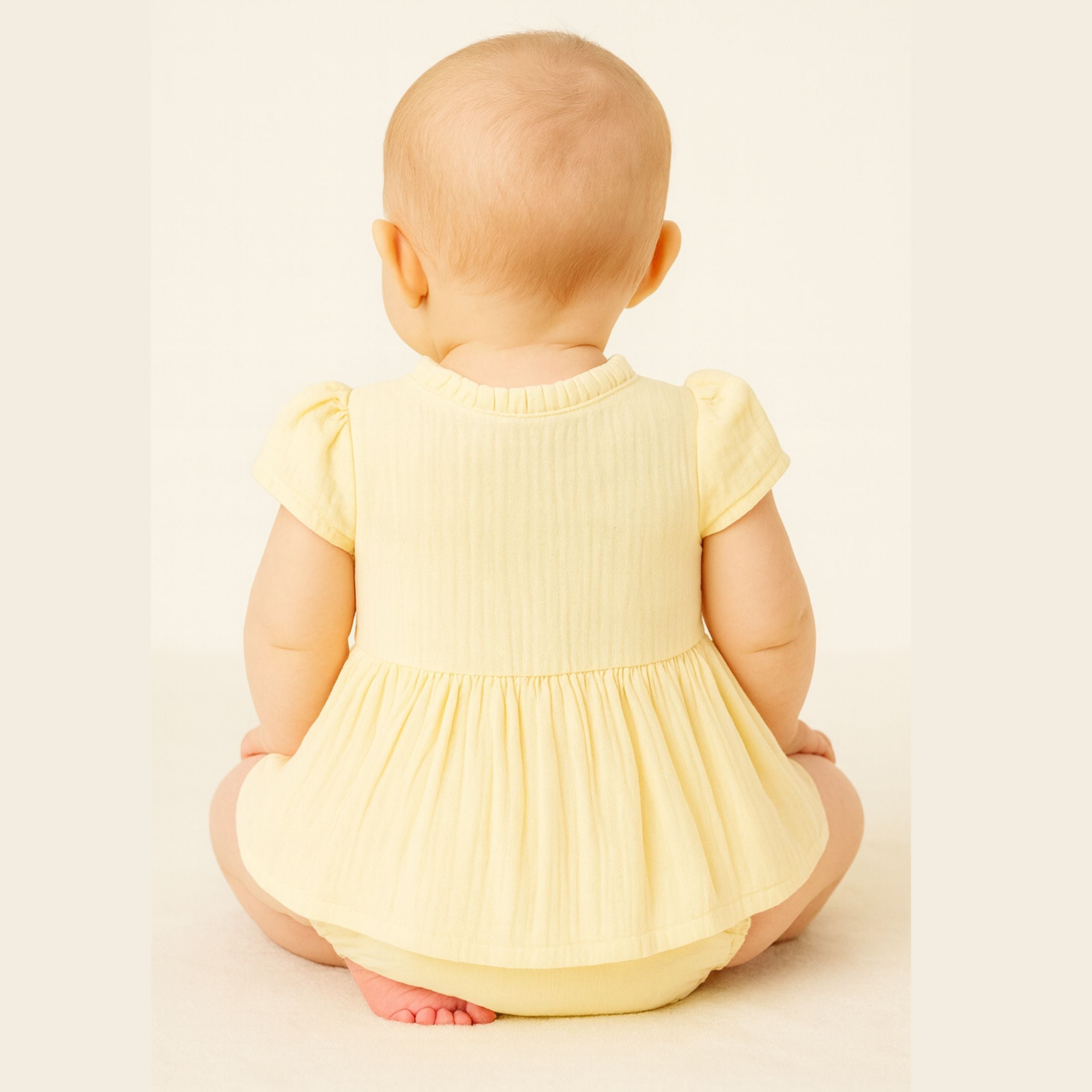 TOFFY HOUSE Girls’ Summer Cotton Frock – Soft Yellow | Ruffle Neckline & Wooden Buttons | New Born – 9 Months
